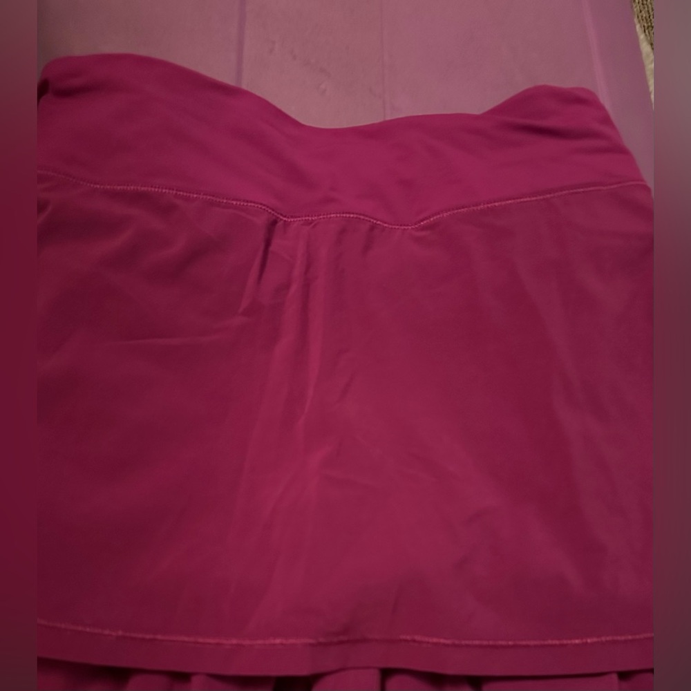 Women’s Lululemon dark pink tennis skort Size 10 only $12!